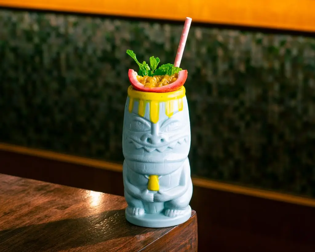 A passion fruit mojito on the bar at The Deck